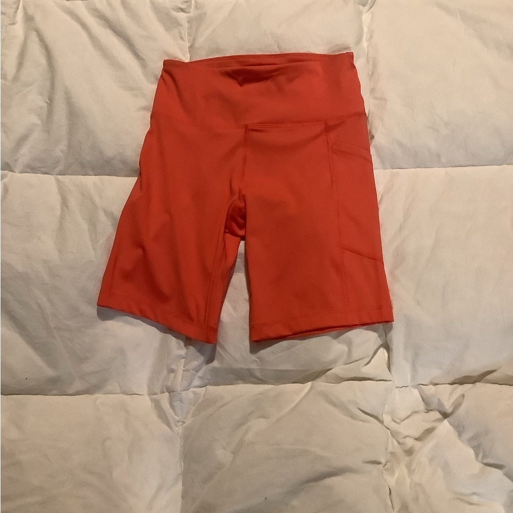 NWOT Calvin Klein small orange shorts
